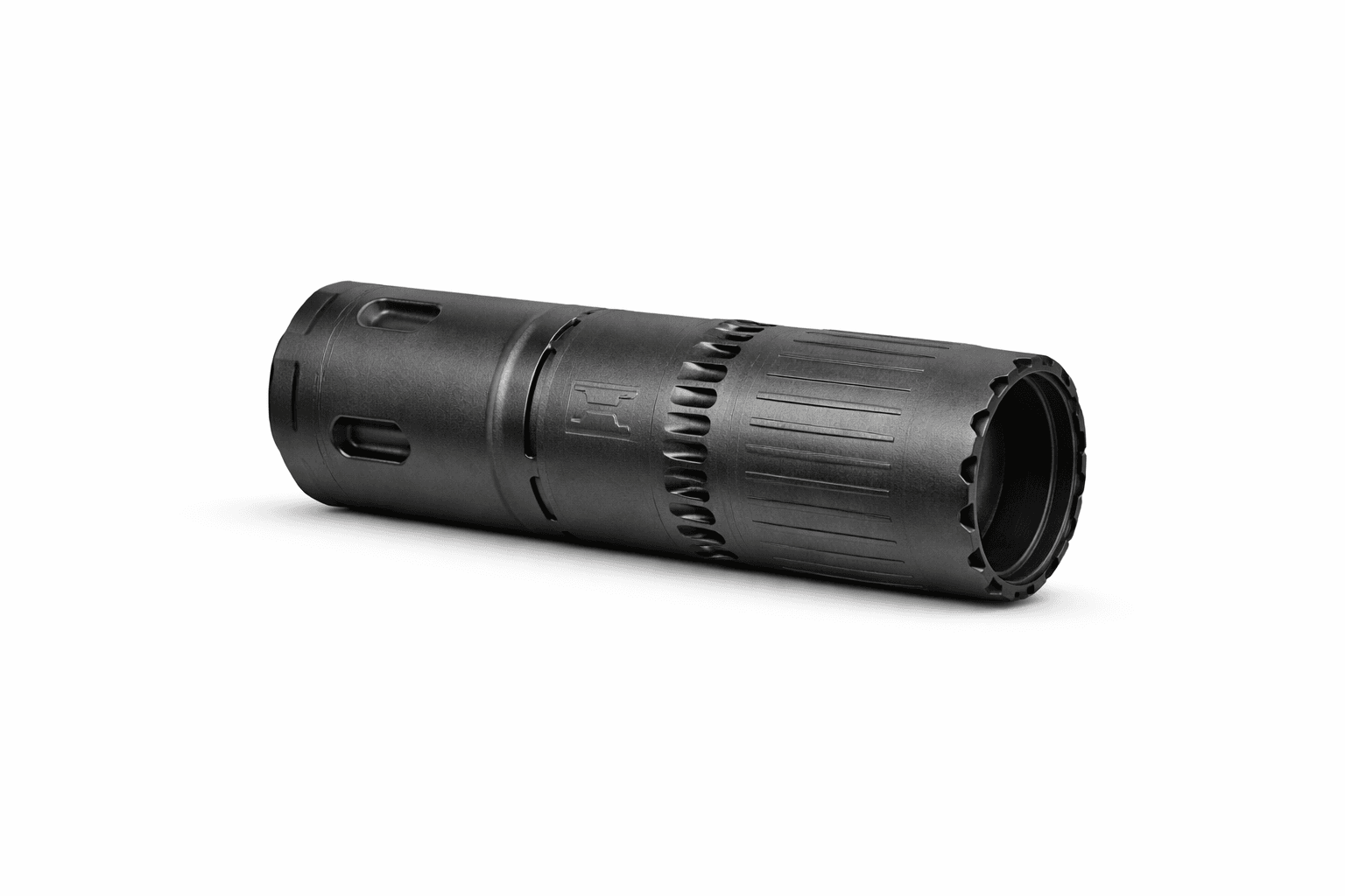 EXO 5.56 suppressor rotated horizontal with shadow ambient intake rifle suppressor matte black finish low profile design