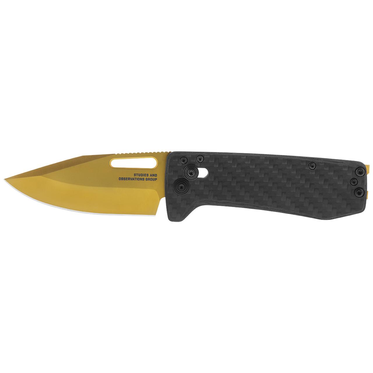 SOG Ultra XR Knife 2.8" Blade Black and Gold Picture of Sog Specialty Knives Inc. ULTRA XR CARBON and GOLD