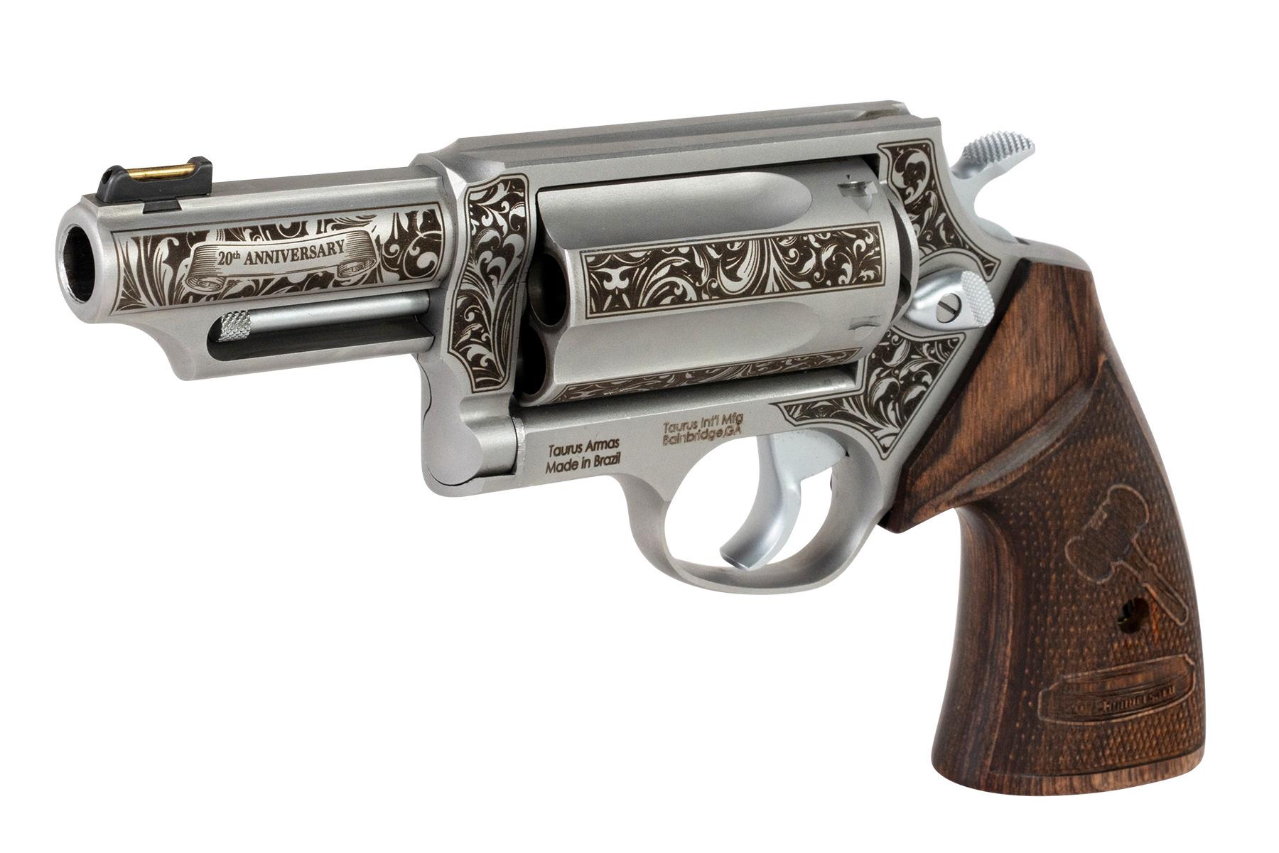 Taurus Judge 20th Anniversary Handgun .45 Colt/410ga 5rd Capacity 3" Barrel Engraved Stainless Wood Grips Picture of Taurus International Inc. TAURUS JUDGE .45 COLT/.410 GA SS 3'' 5S 20 YR
