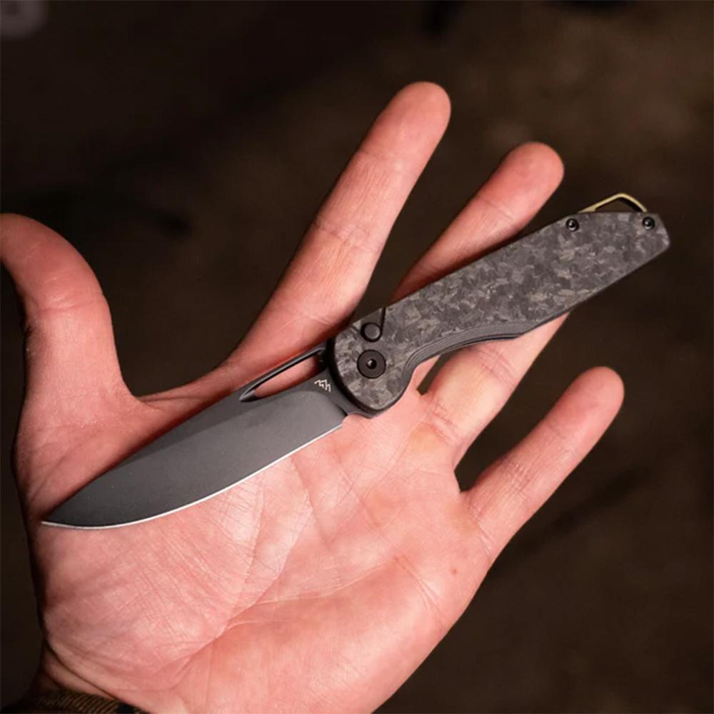 Outdoor Edge Kaytan Folding Knife 3-3/10" Drop Point Blade Black Picture of Outdoor Edge Outdoor Edge Kaytan Knife Solid Forged Carbon Black 8Cr Blade Button Lock