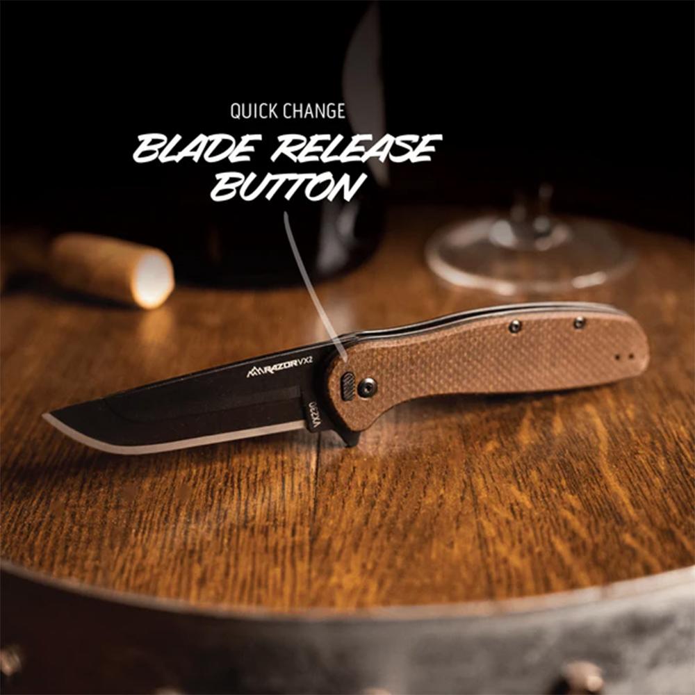 Outdoor Edge Razor VX2 Replaceable Blade Folding Knife 3" Drop Point Blade Brown Picture of Outdoor Edge Outdoor Edge Razor VX2 Knf Brw Burlap Micarta W/ Blk Drp Pnt Blk Hrdwr SA